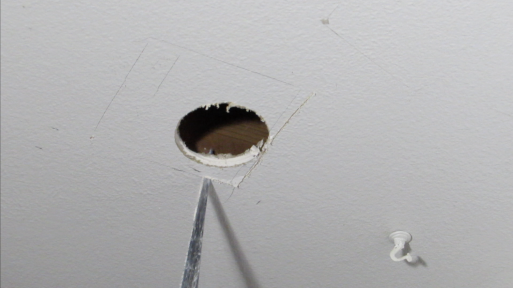 Cutting a hole for ceiling fan